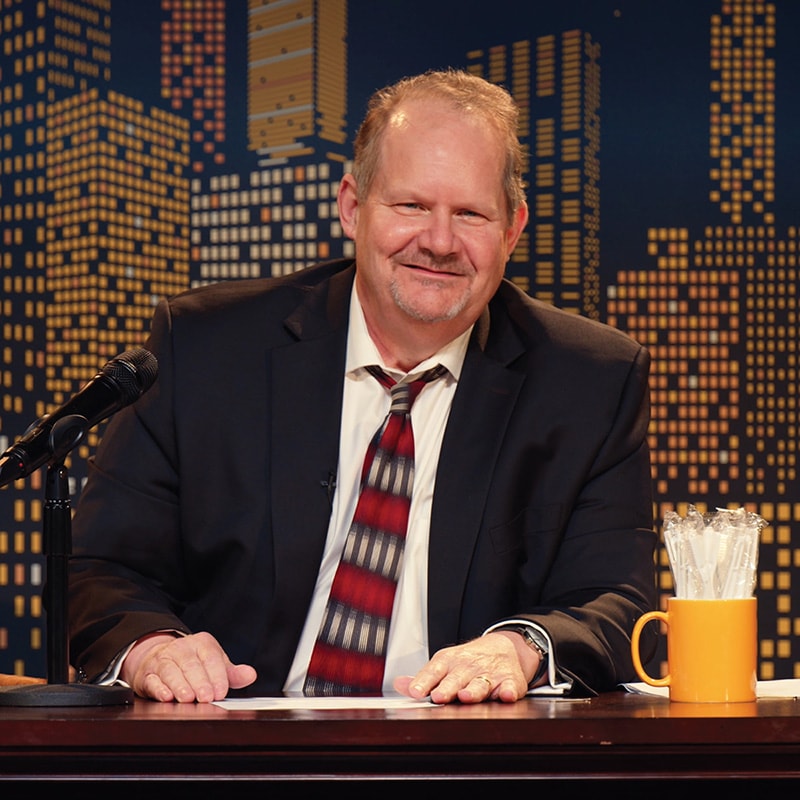 Stand-up comedian performing on stage